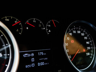 Fototapeta premium Car speedometer at zero on illuminated vehicle dashboard
