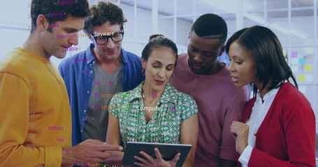 Collaborating IT team examining tablet in office meeting room, with sticky notes and code overlay