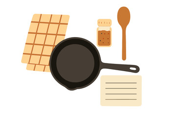 Cooking tools and ingredients arranged on a countertop for a baking project in a cozy kitchen setting