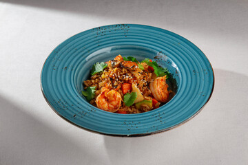 Spicy Korean style kimchi fried rice with shrimp, bell pepper, sesame seeds and fresh cilantro...