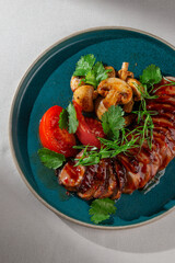 Sliced glazed duck breast served with grilled mushrooms, fresh tomatoes, cilantro and green onions...