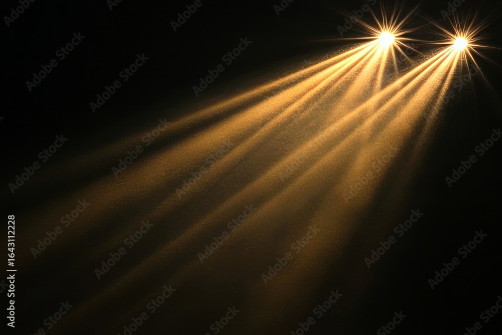 Poster golden rays illuminate the darkness, creating abstract patterns and captivating light effects