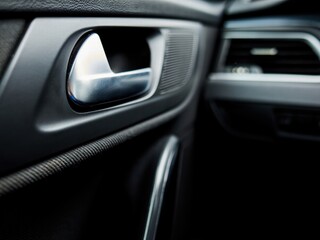 The car door is open and the interior is dark