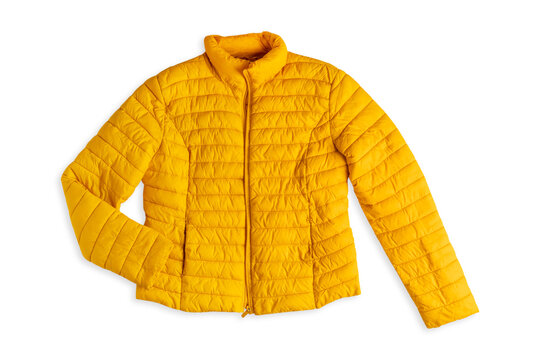 Top view of single bright yellow cozy casual puffer jacket with long sleeves for cold rainy weather of autumn or spring season isolated on white background used as warm comfortable modern clothing