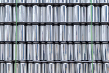 Stacked cans on top of the other