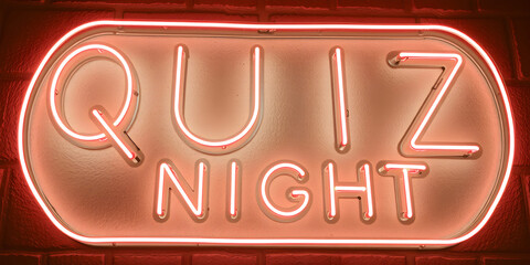 Obraz premium The Neon Quiz Night Sign on a Wall for Fun and Entertainment