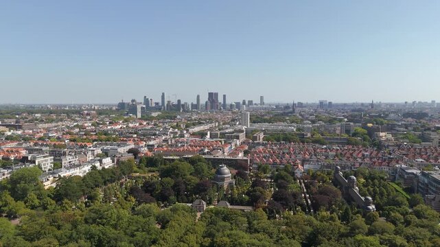 Aerial Panoramic View of St. Petrus Banden Cemetery and The Hague Skyline on a Clear Blue Day