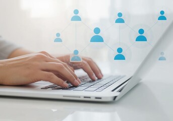 Hands typing on laptop with social network connection icons