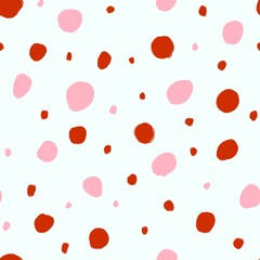 Seamless pattern with red and pink polka dots