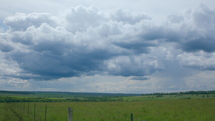 A Scenic Overcast Landscape Featuring Beautiful Rolling Green Hills and Natures Beauty