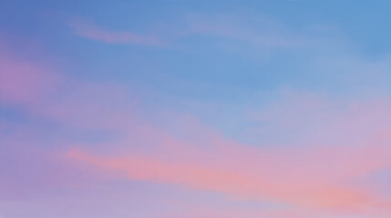 Obraz premium Soft pastel sunset sky with gentle pink, blue, and purple clouds 