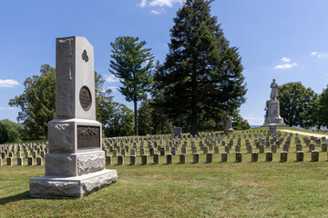 Photo of the Antietam National Cemetery with New York Monument in the foreground 