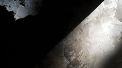 A close-up of a concrete wall reveals raw texture and architectural detail under natural side lighting