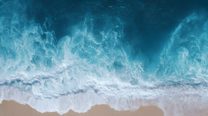 Aerial view of a turquoise coastline with abstract wave patterns and blue tones