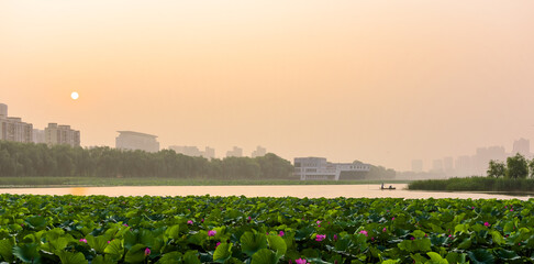 The rivers, bridges, and sidewalks in the urban parks of Tangshan, China form a beautiful skyline...