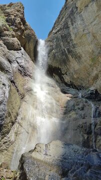 Waterfall in the mountains, 10 meters high, located in the Silbili gorge, Turkestan region, Republic of Kazakhstan.