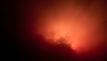 Mysterious Red and Orange Clouds Over Dark Sky at Night Offering Ethereal Atmosphere