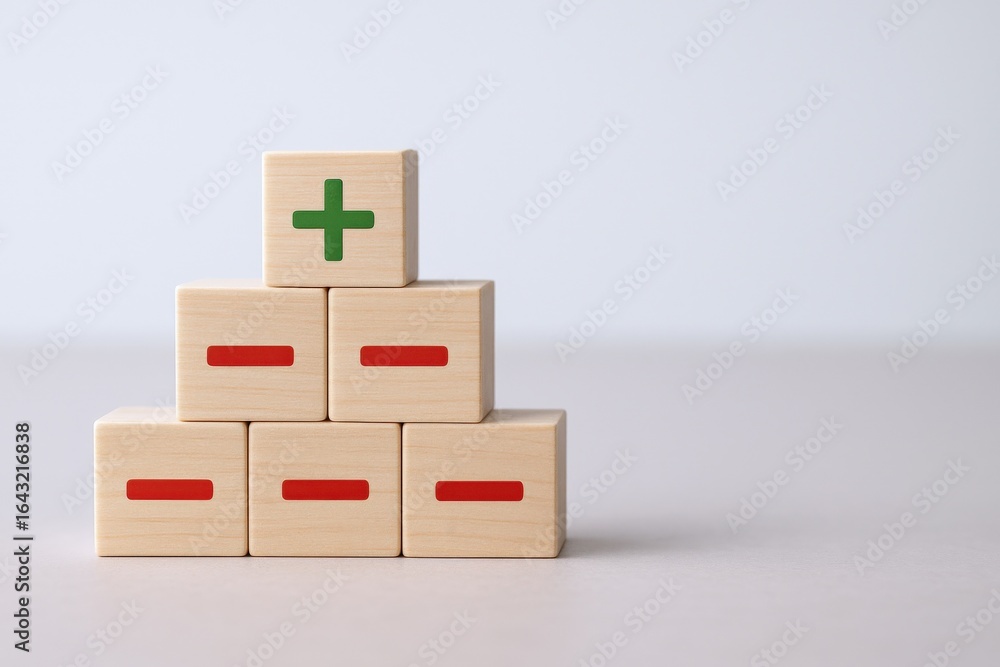 Poster conceptual image displaying plus and minus signs on wooden blocks representing pros and cons