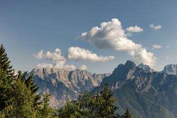 Fototapeta premium alpine mountain peaks under clear blue sky. clear sky with copy space. minimalist alpine landscape. Julian alps, Slovenia
