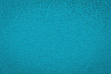 Vibrant turquoise waters reflecting the sun's glow in a tranquil coastal paradise during a serene midday escape