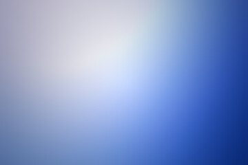 Abstract background of light blue shades with glare and bokeh effect.