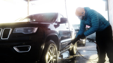 Outdoor high pressure washing for cars. Self-service express car wash.