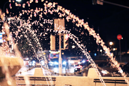 Fototapeta Fountain water in the night - close-up