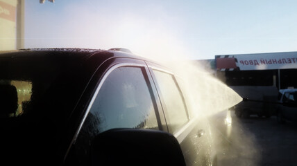 Obraz premium Outdoor high pressure washing for cars. Self-service express car wash.