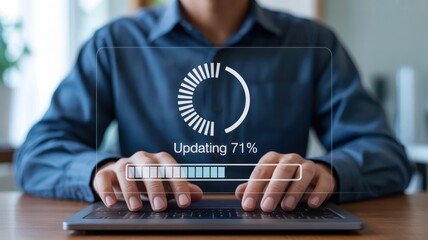 System Update - A man typing on a laptop with a digital overlay showing a circular progress bar for a system update