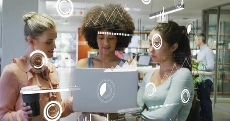 Three coworkers powering laptop in office and analyzing floating data charts toward consensus - Powered by Adobe