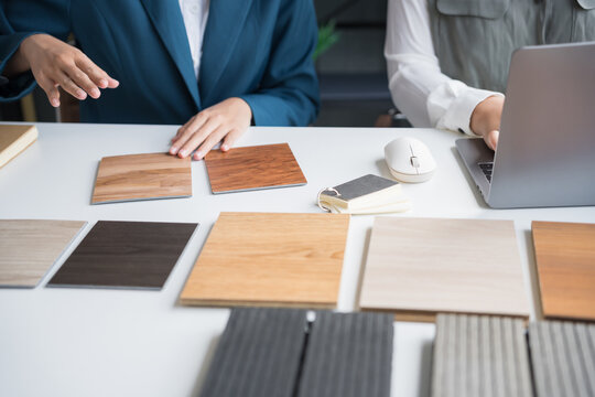 Interior designers brainstorming creative design ideas for modern home in collaborative meetingใ - Powered by Adobe