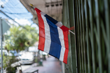 Thai national flag on the city street