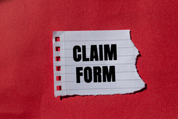 Claim Form message written on ripped torn lined paper on red background. Conceptual Claim Form...