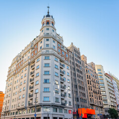 Fototapeta premium Tall neoclassical buildings in the downtown area of Madrid, Plaza de Spain.