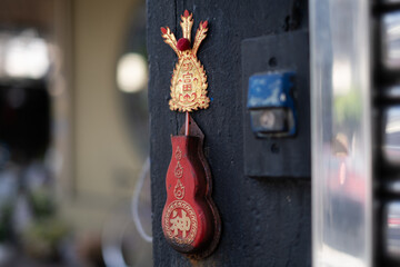 Chinese Incense holder in front of building 