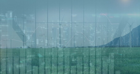 Displaying white wind turbines rotating on grassy field with distant hill, showing financial charts