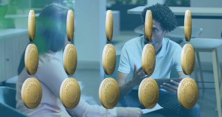 Discussing project details colleagues meeting in modern office lounge, with tablet and papers