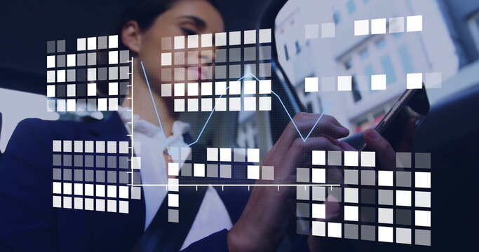 Business professional reviewing smartphone data overlay in train carriage, with blue line graph - Powered by Adobe