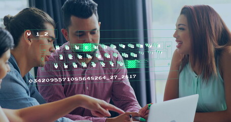 Reviewing data four professionals collaborating in meeting room, with laptop keyboard overlay