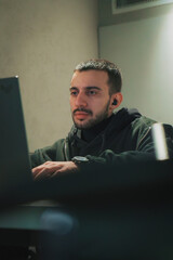 young man working on laptop