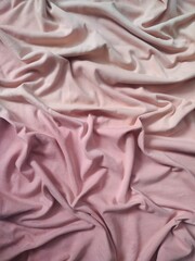 fabric is a material commonly used for clothing whose color has been damaged and faded