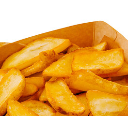 Crispy golden fries served in a cardboard container at a food festival