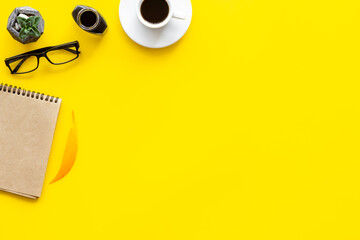 Inkwell and book - writer or blogger working space desktop, top view