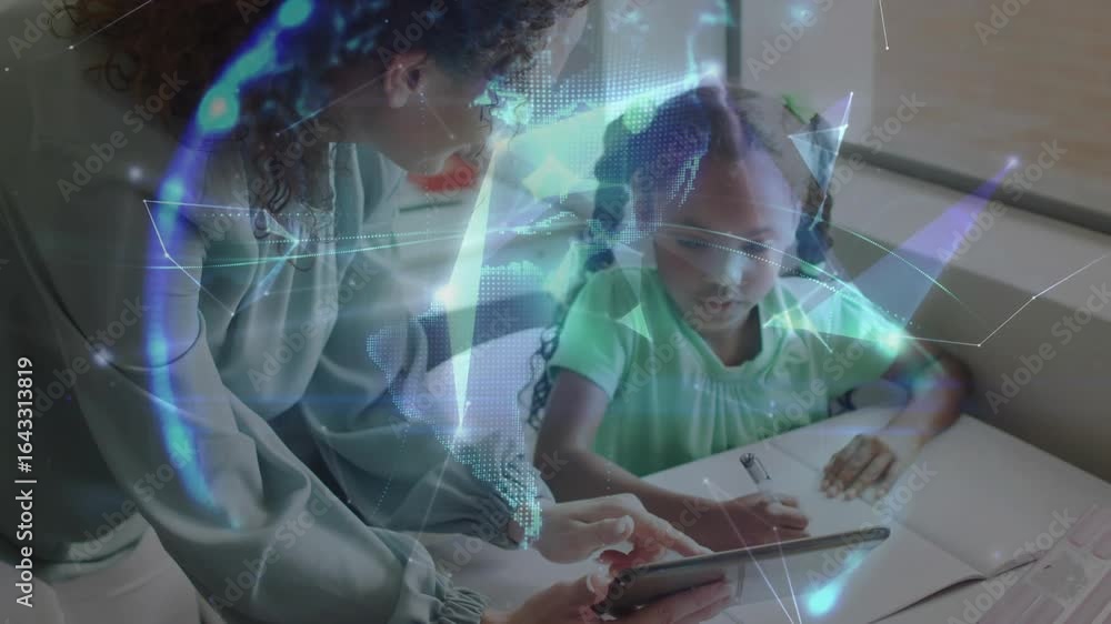 Poster mother guiding daughter through writing by tapping tablet and generating 3d globe for learning