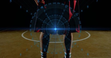 Male player shifting weight holding basketball at court while tracking HUD metrics in sports tech - Powered by Adobe