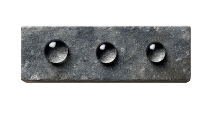 Dark stone slab with three water droplets