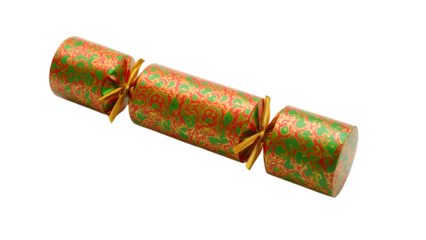Festive christmas cracker in red green and gold with decorative pattern and golden ribbons on the transparent background