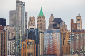 Skyline of New York City featuring iconic skyscrapers against a clear sky