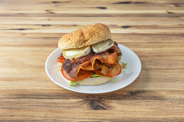 The hamburger, that iconic sandwich composed of ground beef between buns