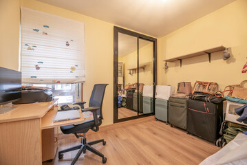 Teenage girl's room with urban-style wardrobe and chalkboard panels for personalized notes